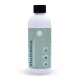 a white bottle with green label 200ml Moringa super liquid concentrate